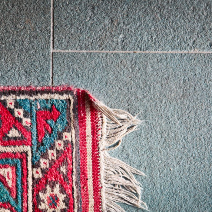 How To Keep Rug Corners Down